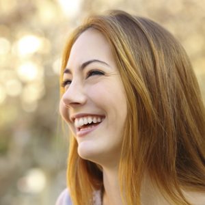 Porcelain dental crowns and bridges helped to fill the gaps in this Middlebury woman's mouth.